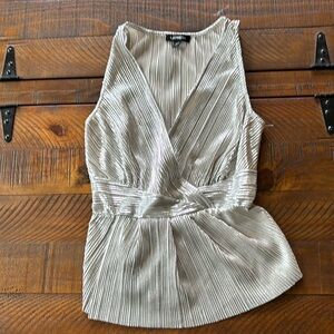 Express Silver Metallic top. Size XS. Worn once. Excellent condition. See photos